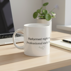 Reformed night owl professional early bird mug on office desk