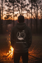 Back of No More Lost Time hoodie at golden hour campfire outdoors